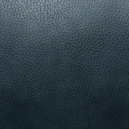 Fauteuil inclinable en cuir véritable avec dossier inclinable, accoudoirs et dossier confortables.