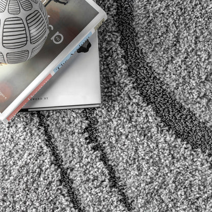 Tapis à poils longs Nuloom Krista contemporain à motifs tourbillonnants