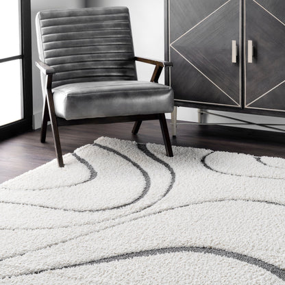 Tapis à poils longs Nuloom Krista contemporain à motifs tourbillonnants
