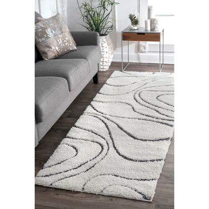 Tapis à poils longs Nuloom Krista contemporain à motifs tourbillonnants