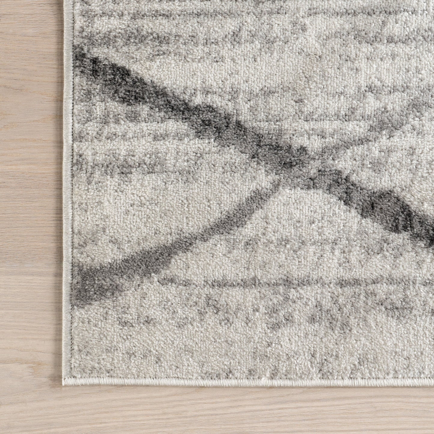 Tapis de sol moderne abstrait Nuloom Skylar