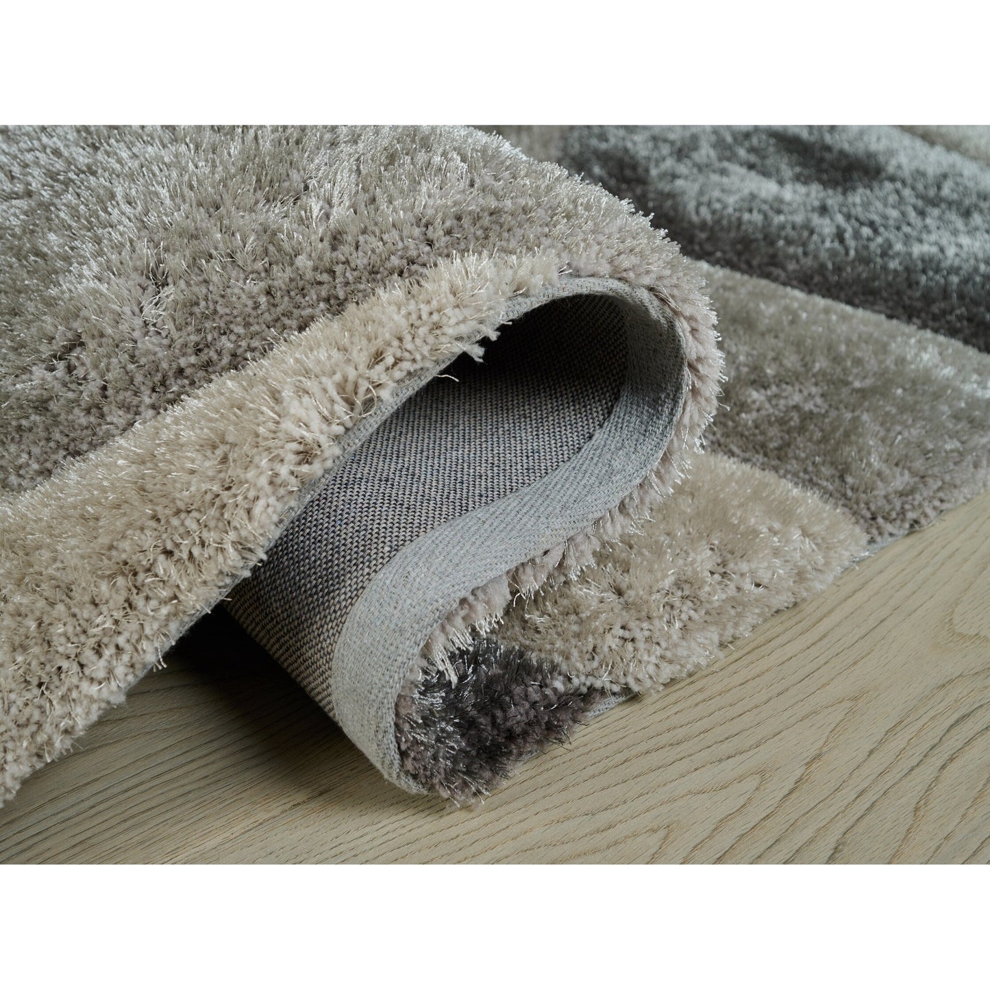 Tapis à poils longs Mateos au design abstrait