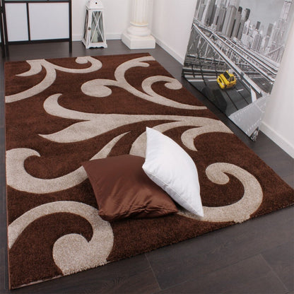 Tapis moderne à motif floral et découpe contour