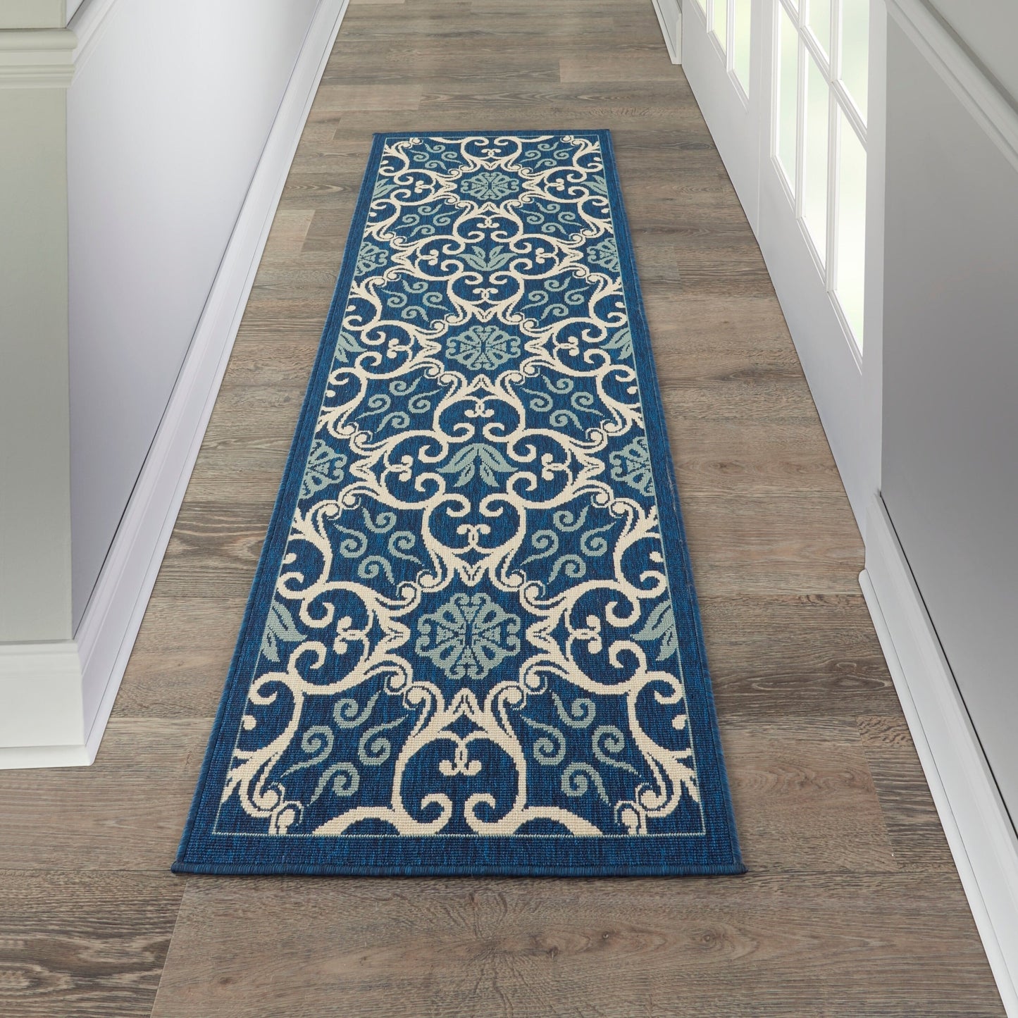 Tapis d'intérieur/extérieur Nourison à motif floral géométrique des Caraïbes