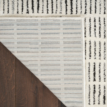 Tapis d'intérieur moderne et confortable Nourison à motifs abstraits