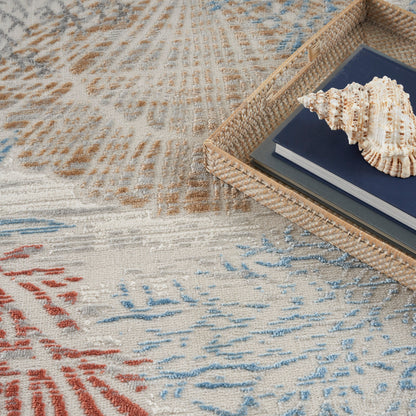 Tapis Nourison Pompéi, motif coquillages et coraux, idéal pour la plage côtière