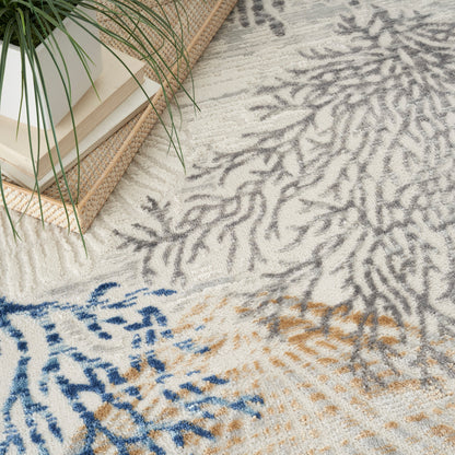 Tapis Nourison Pompéi, motif coquillages et coraux, idéal pour la plage côtière