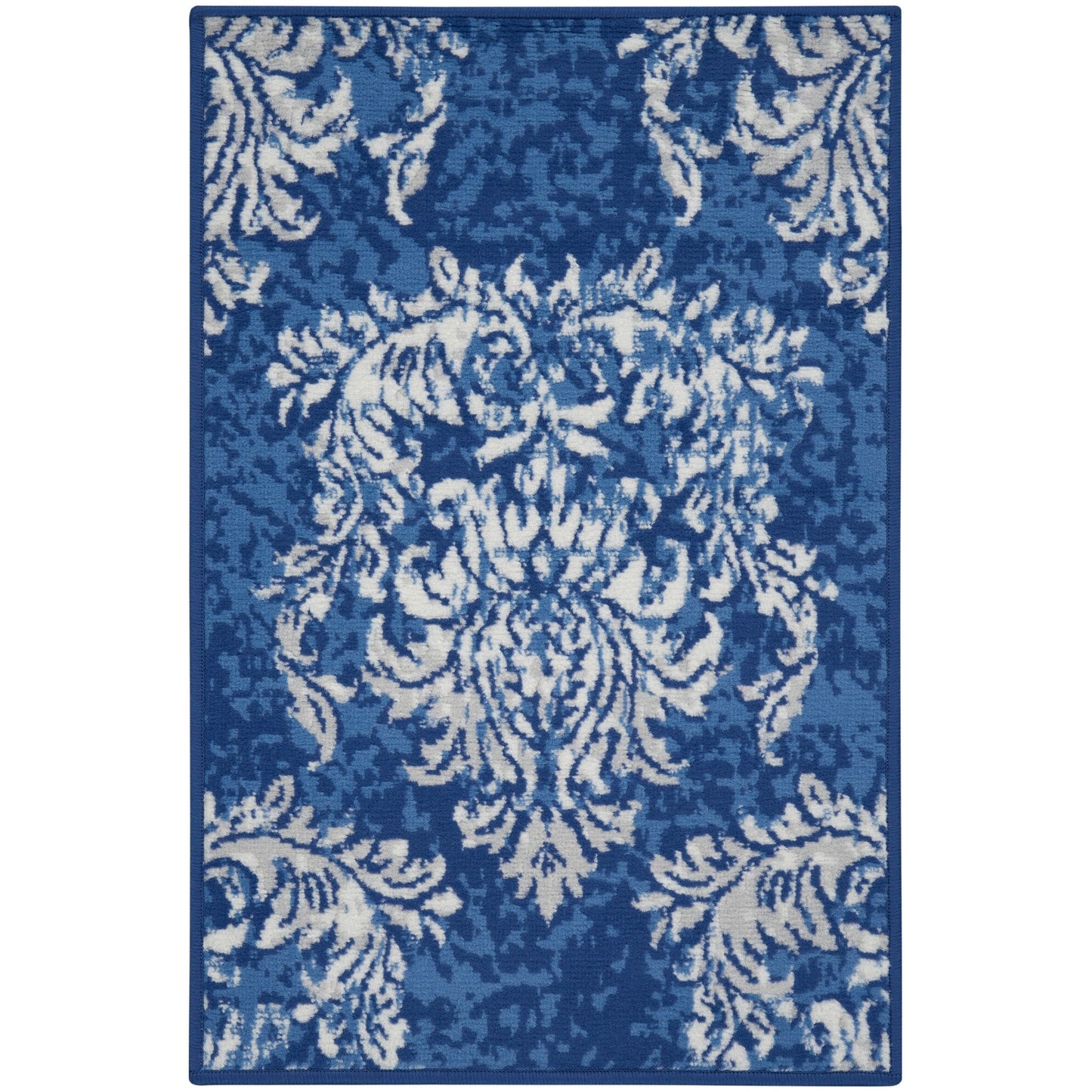 Tapis Nourison Whimsicle style campagne française, motif botanique, ivoire et marine