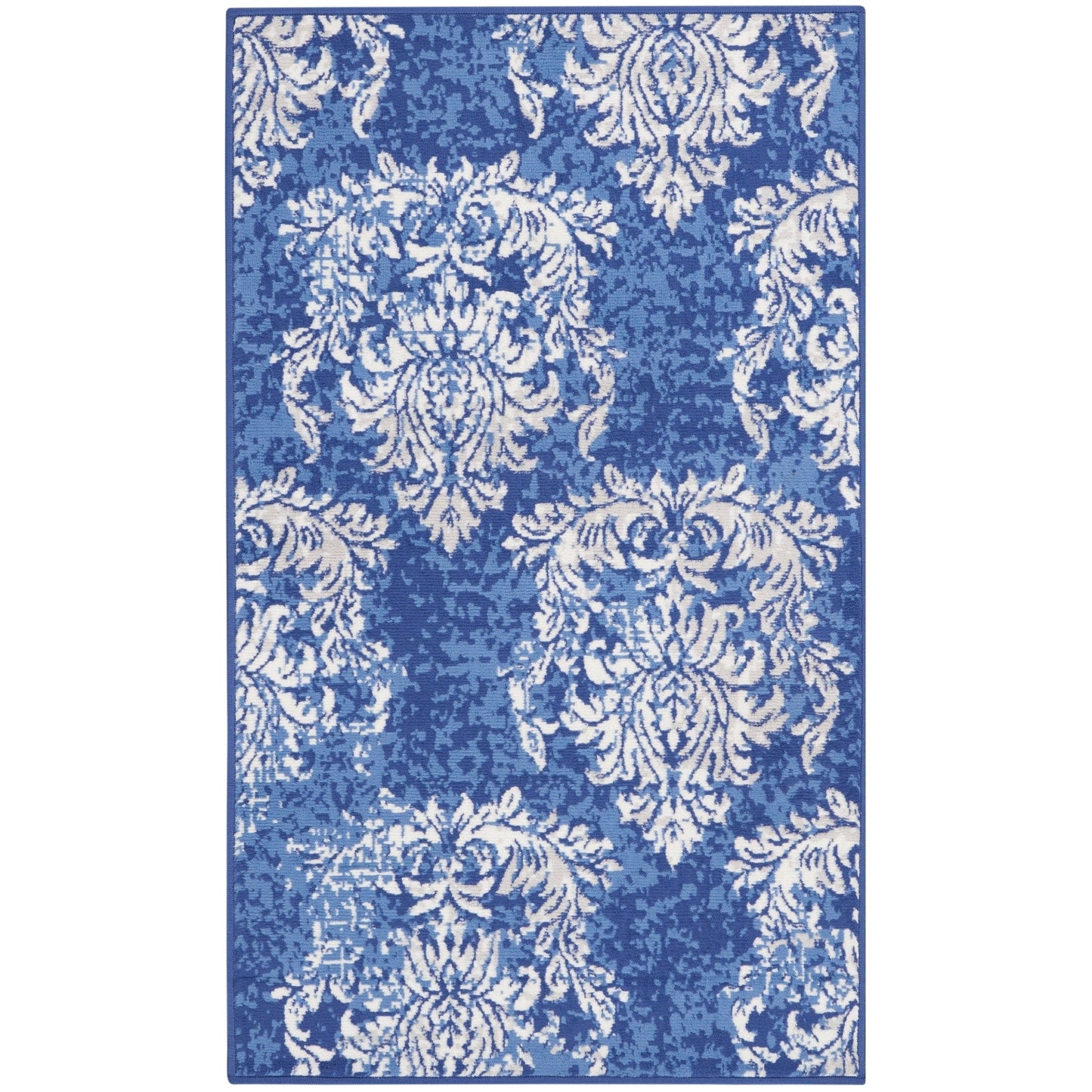 Tapis Nourison Whimsicle style campagne française, motif botanique, ivoire et marine