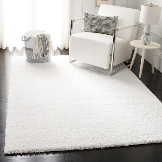 Tapis SAFAVIEH August Wilhelma Shag uni de 3 cm d'épaisseur