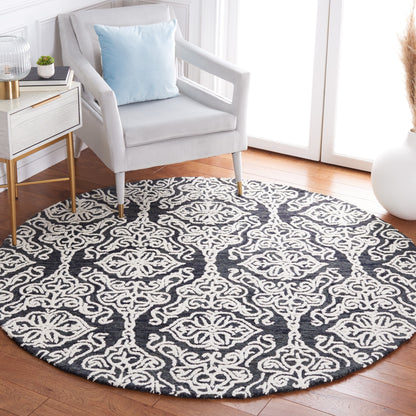 Tapis en laine moderne à motif floral SAFAVIEH fait main Blossom Cateluta