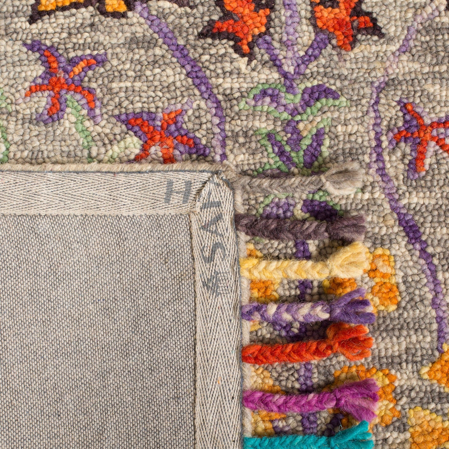 Tapis en laine moderne à motif floral Takuko fait main SAFAVIEH