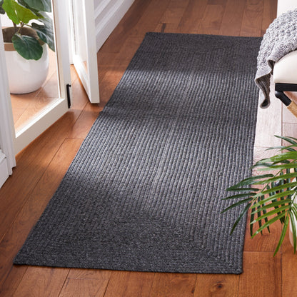 Tapis décontracté tressé à la main SAFAVIEH Anthi