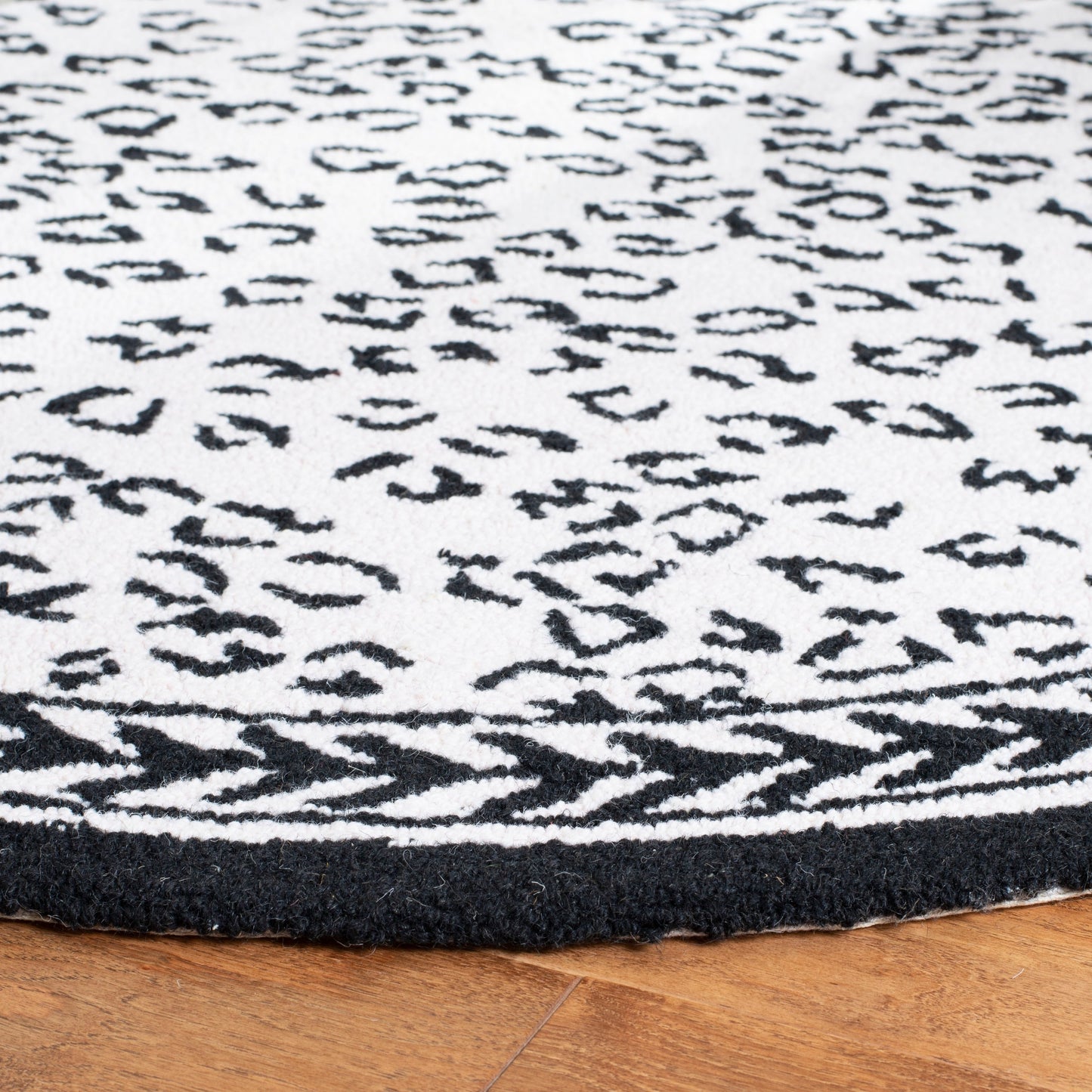 Tapis SAFAVIEH fait main Chelsea Solar Garden Leopard en laine de campagne française