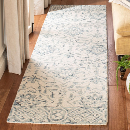 Tapis en laine Elvedina à motif floral, teint à la main par SAFAVIEH