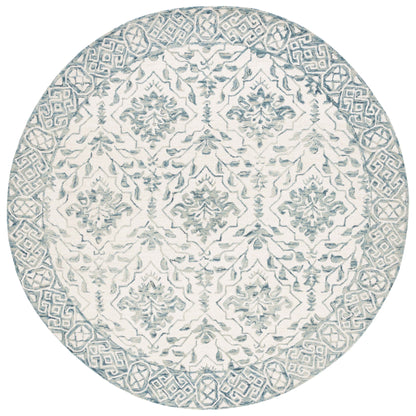 Tapis en laine Elvedina à motif floral, teint à la main par SAFAVIEH