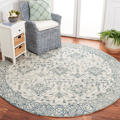 Tapis en laine Elvedina à motif floral, teint à la main par SAFAVIEH