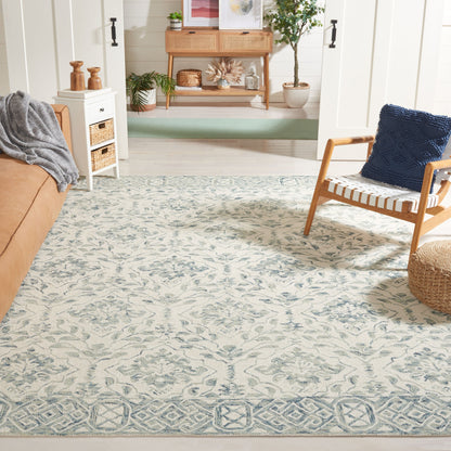 Tapis en laine Elvedina à motif floral, teint à la main par SAFAVIEH