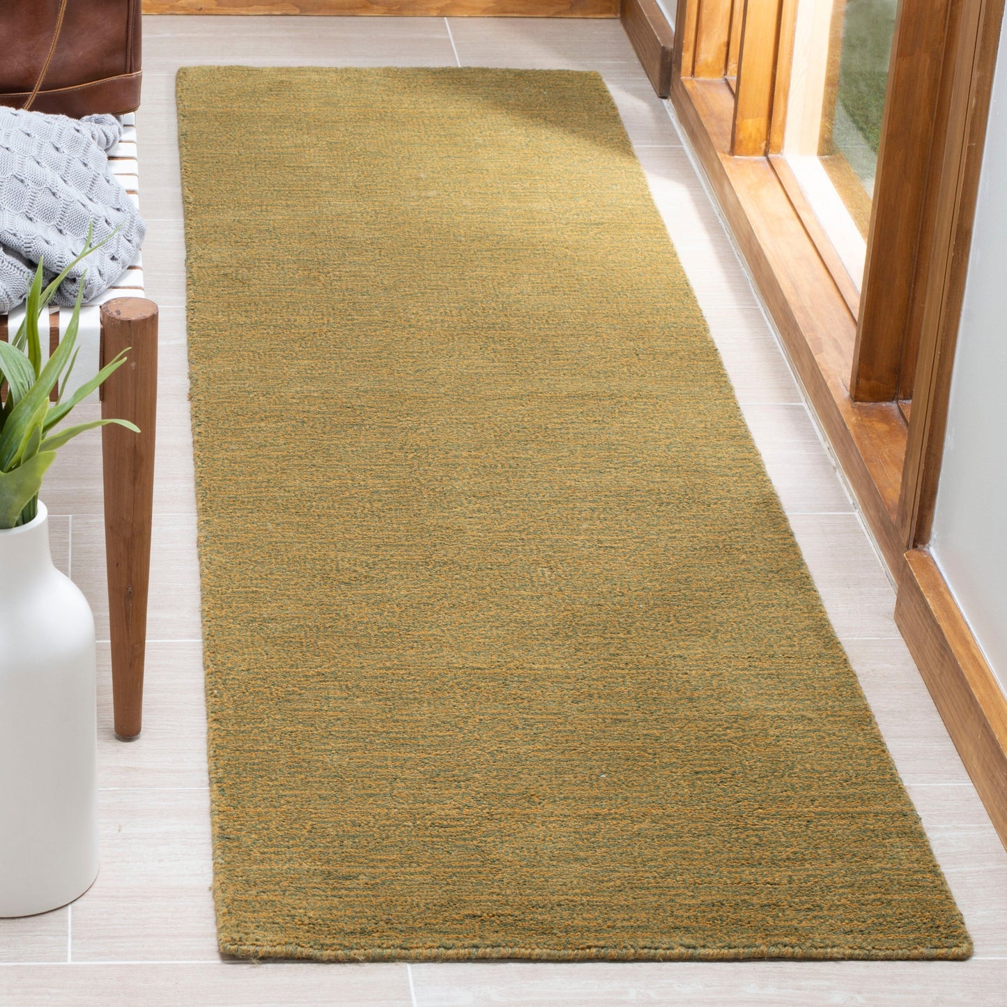Tapis moderne en laine SAFAVIEH fait main, bordure en palmier de l'Himalaya