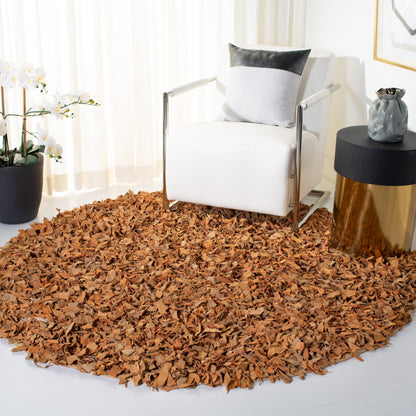 Tapis décoratif moderne SAFAVIEH en cuir shaggy fait main Doinita