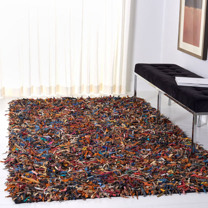 Tapis décoratif moderne SAFAVIEH en cuir shaggy fait main Doinita