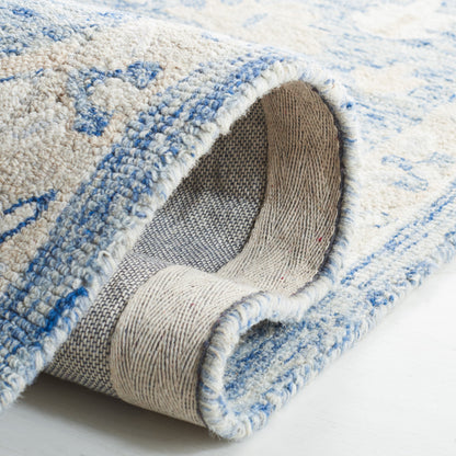 Tapis en laine SAFAVIEH à micro-boucles, motif médaillon Gulseven, fait main