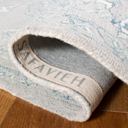 Tapis SAFAVIEH en laine Torbjorg micro-bouclée faite à la main