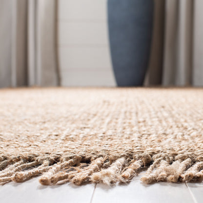 Tapis à franges en jute Eybjorg en fibres naturelles fait main SAFAVIEH
