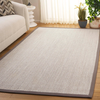 Tapis en sisal Lorine à bordure décontractée en fibres naturelles SAFAVIEH