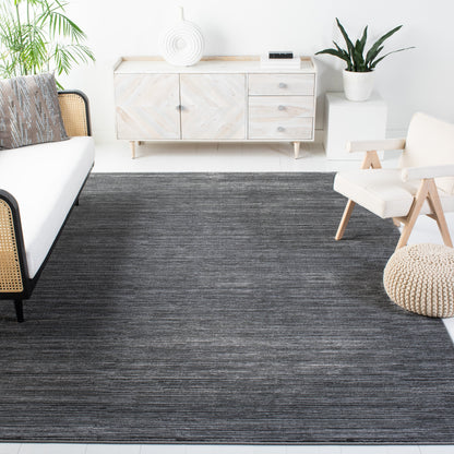 Tapis SAFAVIEH Vision Sunanda moderne à tons ombrés.