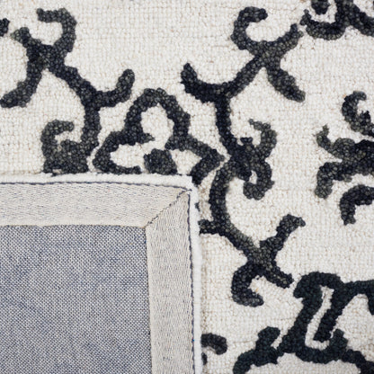 SAFAVIEH, Tapis en laine moderne à motif floral Blossom Vesela, fait main