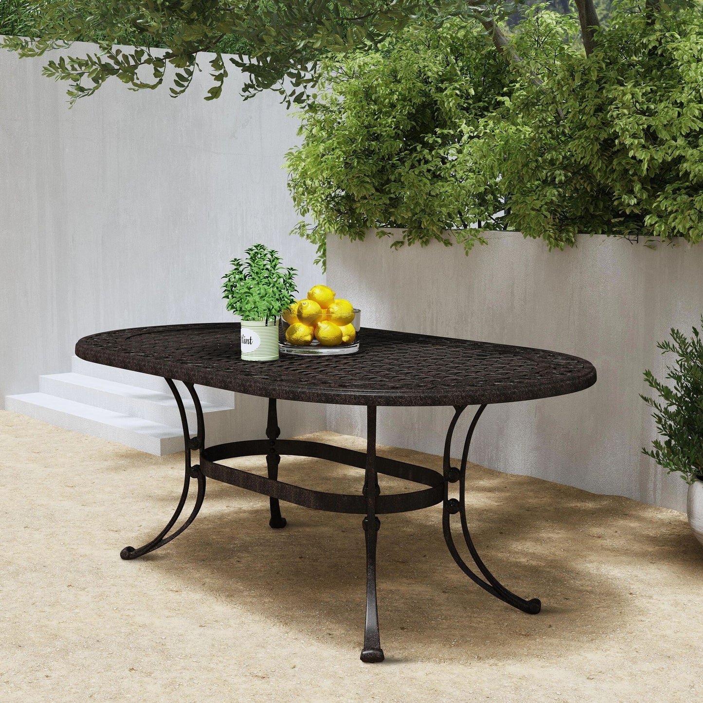 Sanibel Bronze Aluminum 7- Piece Outdoor Dining Set with 72 Oval Dining Table and Six Armchairs by Homestyles