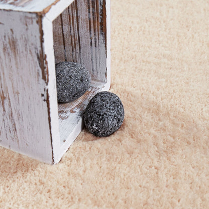 Tapis doux et lavable avec envers antidérapant, disponible en couleurs unies.