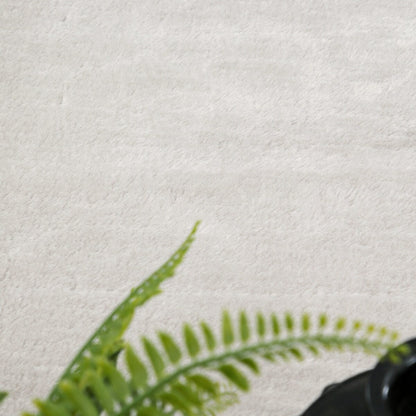 Tapis doux et lavable avec envers antidérapant, disponible en couleurs unies.