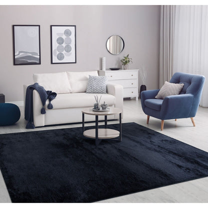 Tapis doux et lavable avec envers antidérapant, disponible en couleurs unies.