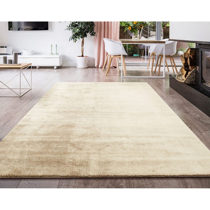 Tapis doux et lavable avec envers antidérapant, disponible en couleurs unies.
