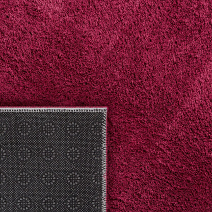 Tapis doux et lavable avec envers antidérapant, disponible en couleurs unies.